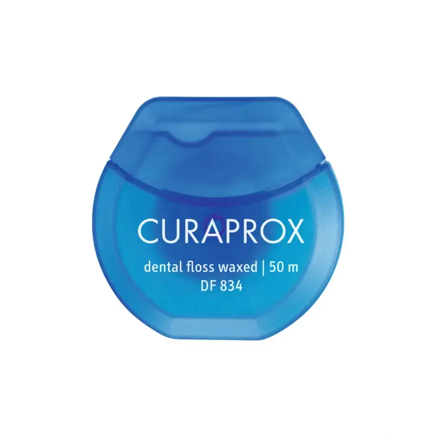 Curaprox Межзубная вощёная нить с ароматом мяты DF 834 50 м